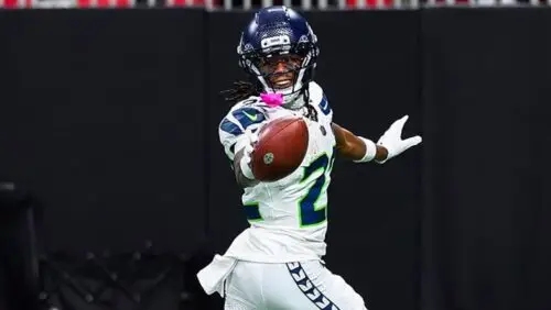 Rashid Shaheed celebrates scoring a touchdown for the Seattle Seahawks